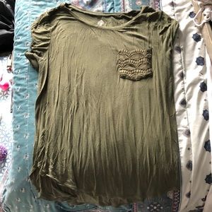 Green shirt with decorative pocket